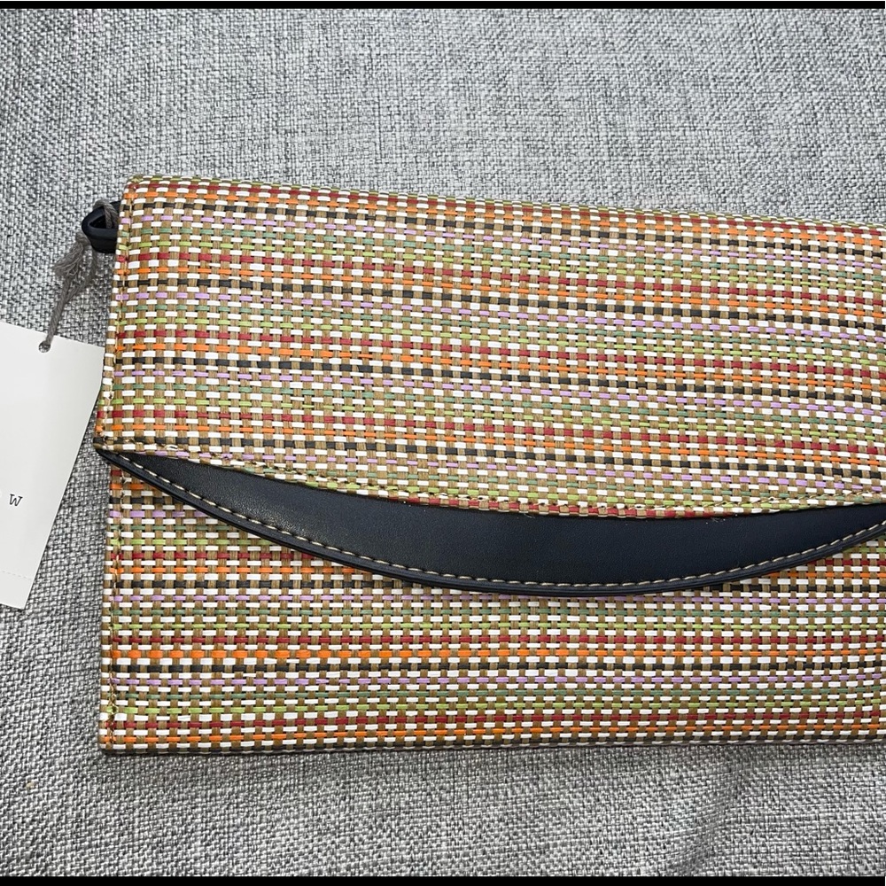 A new Day Multi color woven clutch purse bag